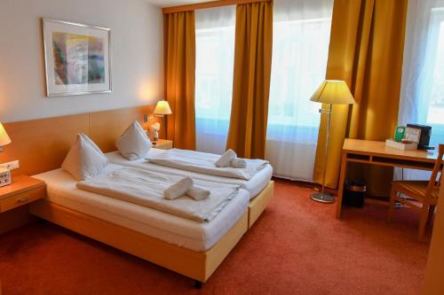 Imagen de la habitación del Hotel Motel55 - nettes mit Self Check-In in Villach, Warmbad. Foto 20