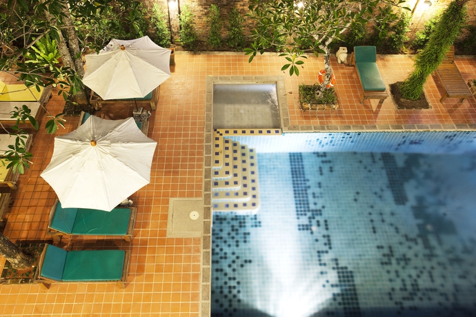 Imagen de la piscina del Hotel Motive Cottage Resort. Foto 7