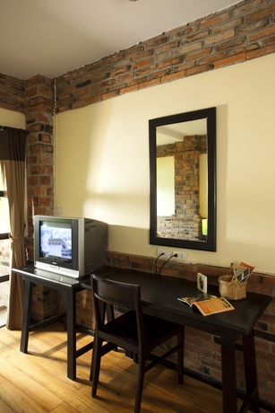 Imagen de la habitación del Hotel Motive Cottage Resort. Foto 3