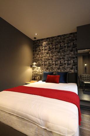 Imagen de la habitación del Hotel Moto. Foto 15