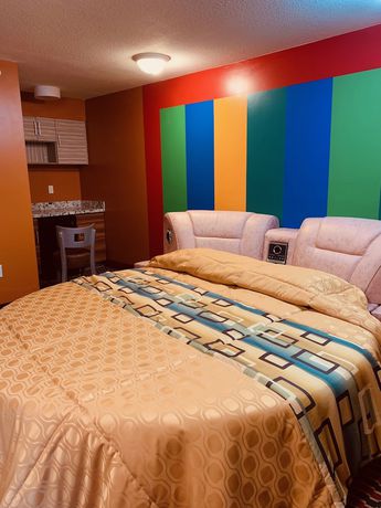 Imagen de la habitación del Hotel Motor City Inn and Suites. Foto 9