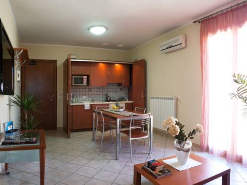 Imagen de la habitación del Hotel Motta Residence. Foto 4