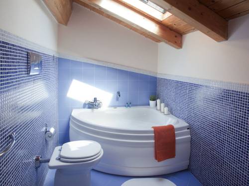 Imagen de la habitación del Hotel Motta Residence. Foto 6