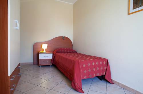 Imagen de la habitación del Hotel Motta Residence. Foto 10