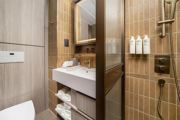 Imagen de la habitación del Hotel Motto by Hilton Hong Kong Soho. Foto 4