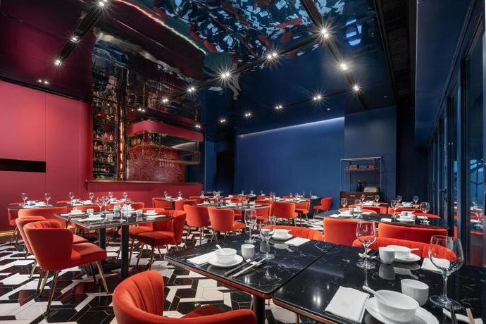 Imagen del bar/restaurante del Hotel Motto by Hilton Hong Kong Soho. Foto 2