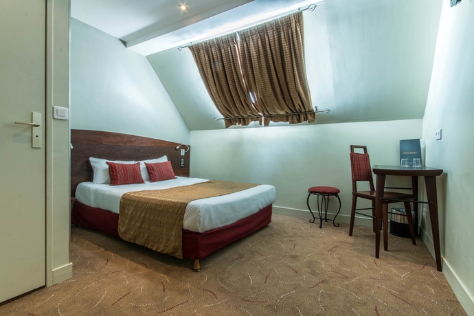 Imagen de la habitación del Hotel Moulin Plaza. Foto 14