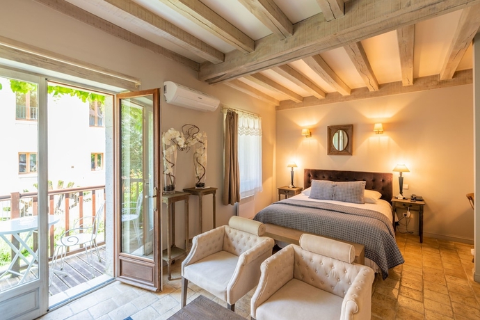Imagen de la habitación del Hotel Moulin de Vigonac. Foto 11