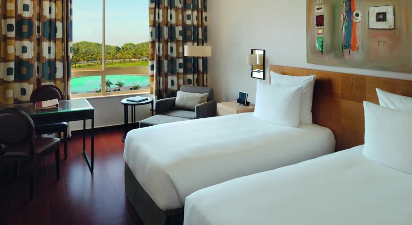 Imagen de la habitación del Hotel Mövenpick Ambassador Accra. Foto 14