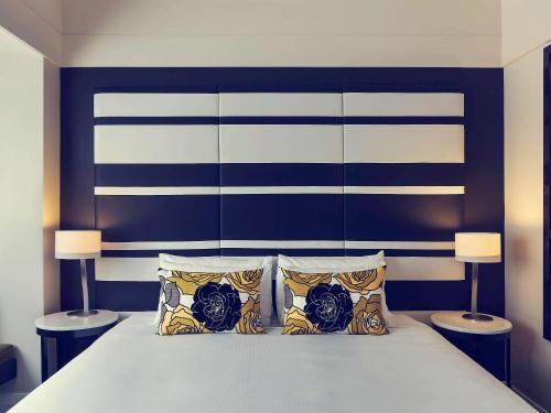 Imagen de la habitación del Hotel Mövenpick Auckland. Foto 17