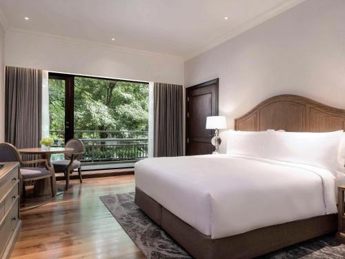 Imagen de la habitación del Hotel Mövenpick Bdms Wellness Resort Bangkok. Foto 18