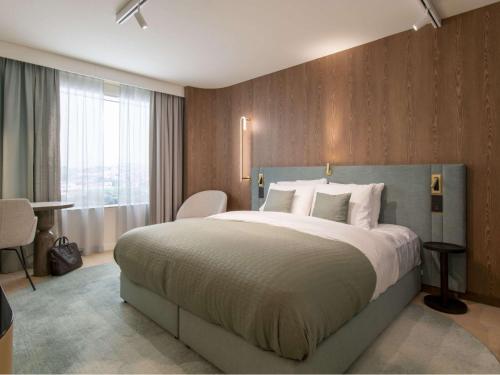 Imagen de la habitación del Hotel M&ouml;venpick Brussels Airport. Foto 6