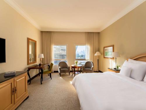 Imagen de la habitación del Hotel Mövenpick Doha. Foto 19