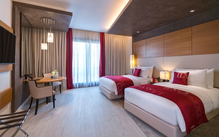 Imagen de la habitación del Hotel Mövenpick Du Lac Tunis. Foto 16