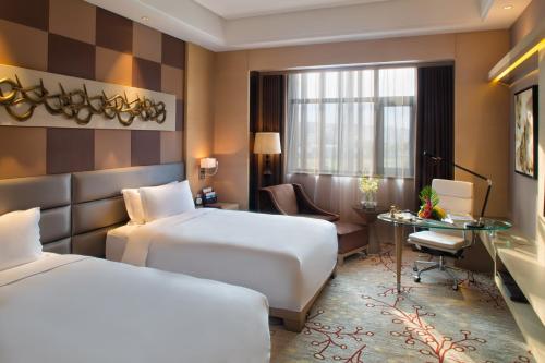 Imagen de la habitación del Hotel Mövenpick Enshi. Foto 7