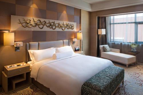 Imagen de la habitación del Hotel Mövenpick Enshi. Foto 8