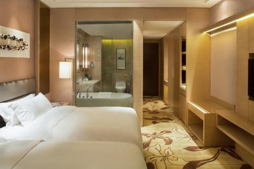 Imagen de la habitación del Hotel Mövenpick Enshi. Foto 9