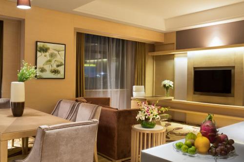 Imagen de la habitación del Hotel Mövenpick Enshi. Foto 10