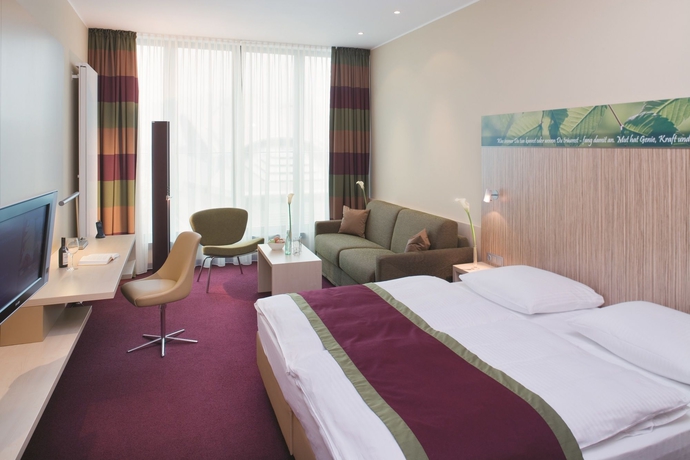Imagen de la habitación del Hotel Mövenpick Frankfurt City. Foto 7