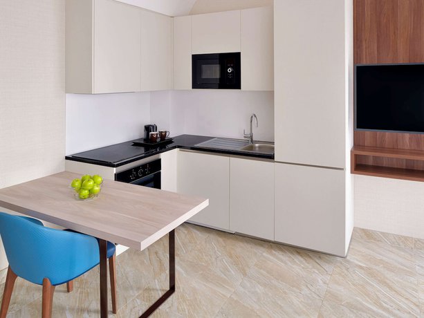 Imagen de la habitación del Hotel Mövenpick Hotel Apartments Downtown Dubai. Foto 7