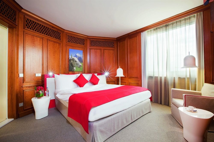 Imagen de la habitación del Hotel Mövenpick Hotel Geneva. Foto 3