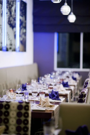 Imagen del bar/restaurante del Hotel Mövenpick Hotel Hanoi Centre. Foto 2