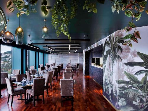 Imagen del bar/restaurante del Hotel Mövenpick Hotel Wellington. Foto 11