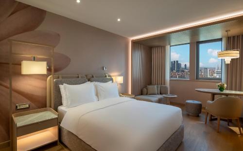 Imagen de la habitación del Hotel Mövenpick Istanbul Bosphorus. Foto 16