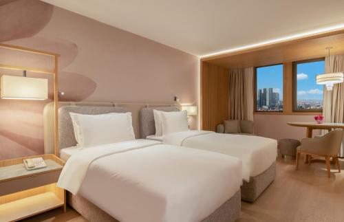 Imagen de la habitación del Hotel Mövenpick Istanbul Bosphorus. Foto 17