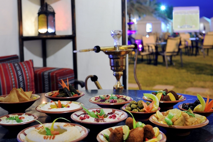 Imagen del bar/restaurante del Hotel M&ouml;venpick Kuwait. Foto 6