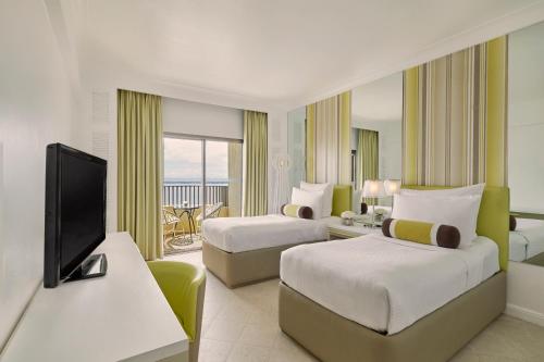Imagen de la habitación del Hotel Mövenpick Mactan Island Cebu. Foto 13