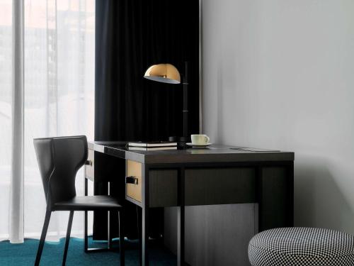 Imagen de la habitación del Hotel Mövenpick Melbourne On Spencer. Foto 14