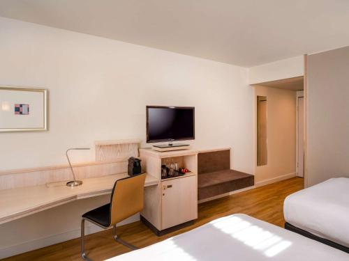 Imagen de la habitación del Hotel Mövenpick München Airport. Foto 9