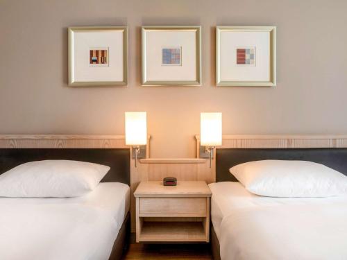 Imagen de la habitación del Hotel Mövenpick München Airport. Foto 14