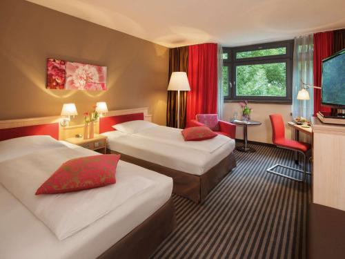 Imagen de la habitación del Hotel Mövenpick München Airport. Foto 17