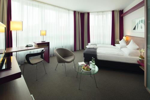 Imagen de la habitación del Hotel Mövenpick Münster. Foto 9