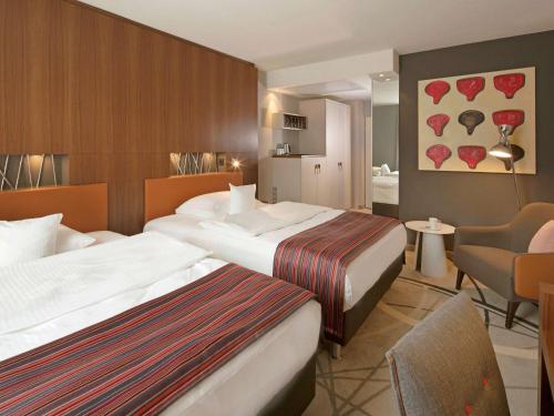 Imagen de la habitación del Hotel Mövenpick Münster. Foto 17