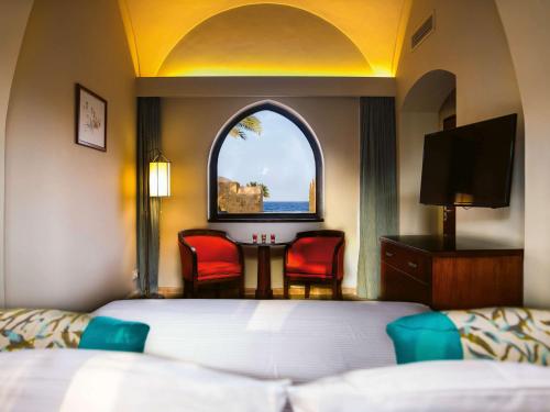Imagen de la habitación del Hotel Mövenpick Resort El Quseir. Foto 14