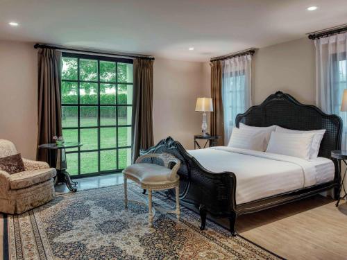 Imagen de la habitación del Hotel M&ouml;venpick Resort Khao Yai. Foto 16