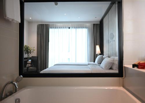 Imagen de la habitación del Hotel Mövenpick Sukhumvit 15 Bangkok. Foto 17