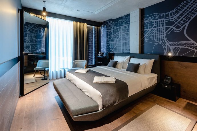 Imagen de la habitación del Hotel Mövenpick Zagreb. Foto 8