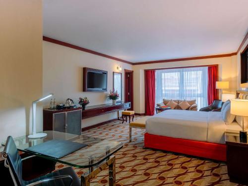Imagen de la habitación del Hotel Mövenpick and Residences Nairobi. Foto 15