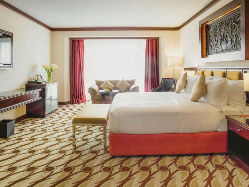 Imagen de la habitación del Hotel Mövenpick and Residences Nairobi. Foto 17