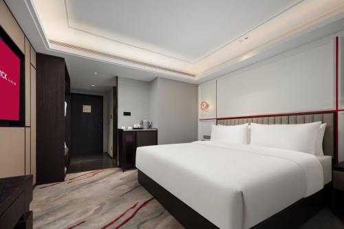 Imagen de la habitación del Hotel M&ouml;venpick by Accor Binjiang Nanjing. Foto 20