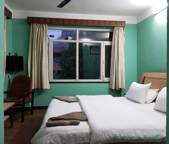 Imagen de la habitación del Hotel Mount Annapurna Guest House. Foto 7