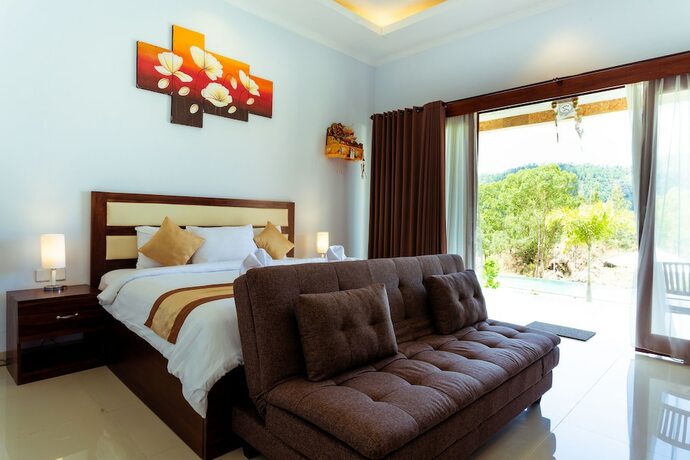 Imagen de la habitación del Hotel Mount Batur Villa. Foto 22