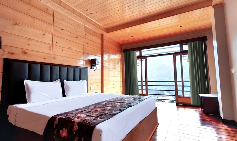 Imagen de la habitación del Hotel Mount Bayul Shangri-La Resort. Foto 6