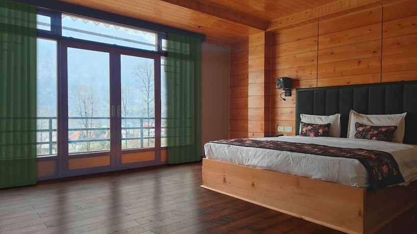 Imagen de la habitación del Hotel Mount Bayul Shangri-La Resort. Foto 8