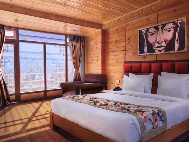 Imagen de la habitación del Hotel Mount Bayul Shangri-La Resort. Foto 10