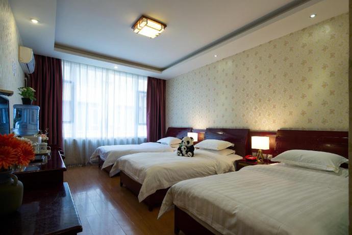 Imagen de la habitación del Hotel Mount Emei Happy Hotel. Foto 3